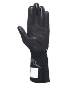 Alpinestars Tech-1 KX V4 handsker, kartinghandsker, sort, set fra håndfladen med 3D-silikonegreb, udvendige sømme og ribbet manchet med gråt Astars-logo, professionelt motorsport-racerudstyr
