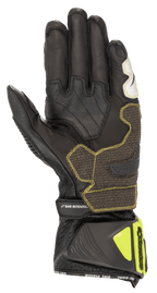 Alpinestars GP Tech V2 handsker, sort og gul fluo, set fra håndfladesiden med kængurulæderkonstruktion, forstærkede gribepaneler med gule syninger, ergonomisk manchet med gule fluo-beskyttere og 'SAFE RETENTION'-strop, professionelt motorcykeludstyr til racing