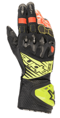 Alpinestars GP Tech V2 handsker, motorcykelracinghandsker, sort med gul fluo og røde detaljer, med hård knobeskyttelse, perforeret lædermanchet med DFS-branding og harmonika-strækpaneler for optimal fleksibilitet.