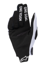 Alpinestars 2025 Radar Pro handsker, motocrosshandsker, hvid og sort, set fra håndfladen med sort syntetisk ruskind, 'ONE GOAL ONE VISION'-tekst på fingrene, hvide mesh-sidepaneler og Alpinestars-logo ved håndleddet.