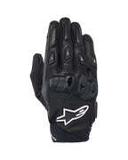 Alpinestars SP X 7 handsker, korte sportsmotorcykelhandsker, sort og hvid, med perforeret læderkonstruktion, dobbelt-densitet TPU-knobeskyttelse og hvidt Alpinestars stjernelogo, designet til performance-kørsel på vej