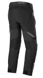 Alpinestars ST-7 2L GORE-TEX Pants, Black and Dark Gray, back view, waterproof motorcycle adventure touring pants featuring reinforced panels, GORE-TEX branding on the lower leg, and adjustable ankle straps