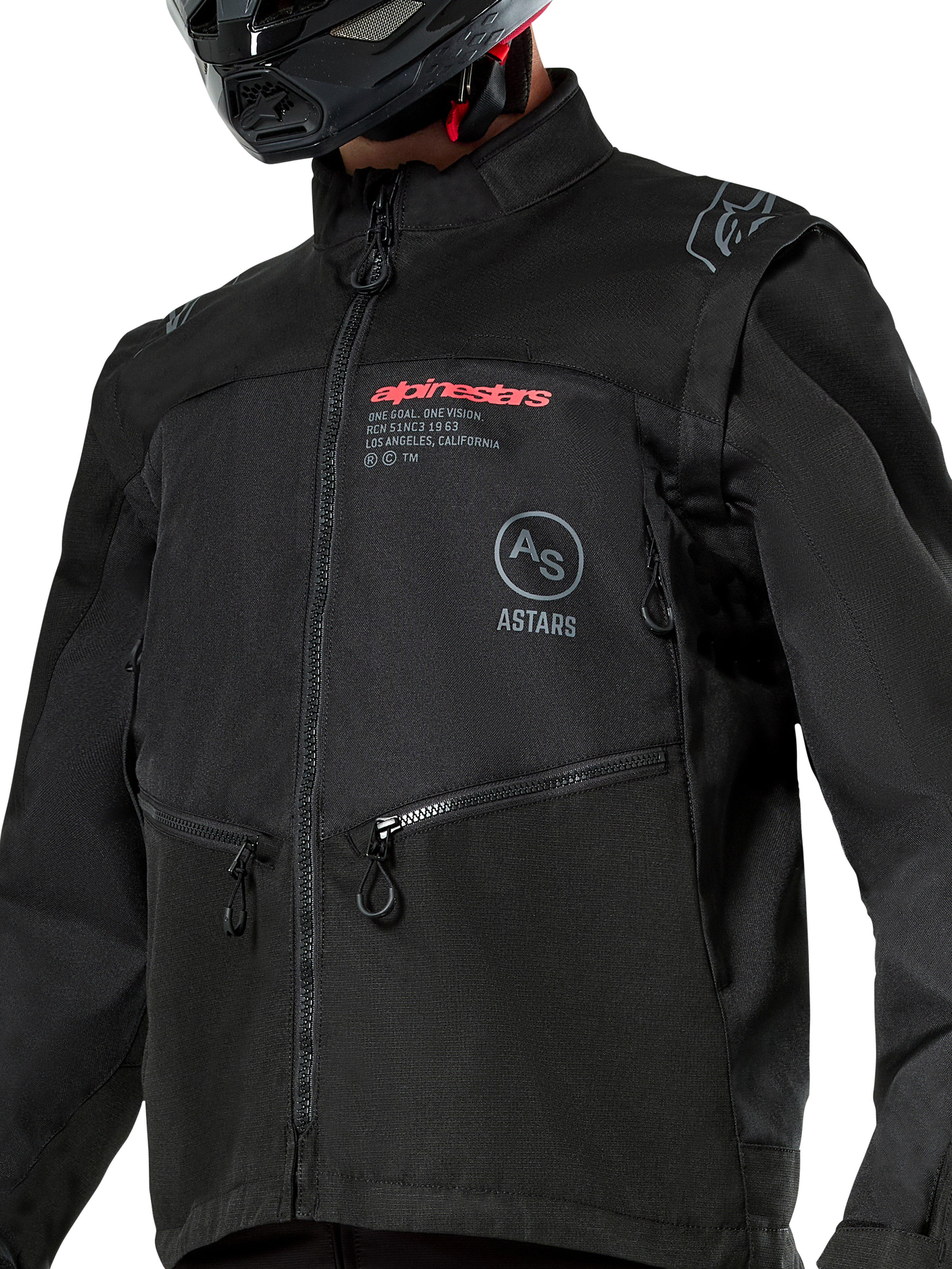 Alpinestars Pro-Dura-jakke, sort off-road motorcykeljakke med rødt Alpinestars-branding og et gråt cirkulært Astars-logo på brystet, lynlåslommer, holdbar ripstop-tekstilkonstruktion, rally-inspireret design til enduro-kørsel.
