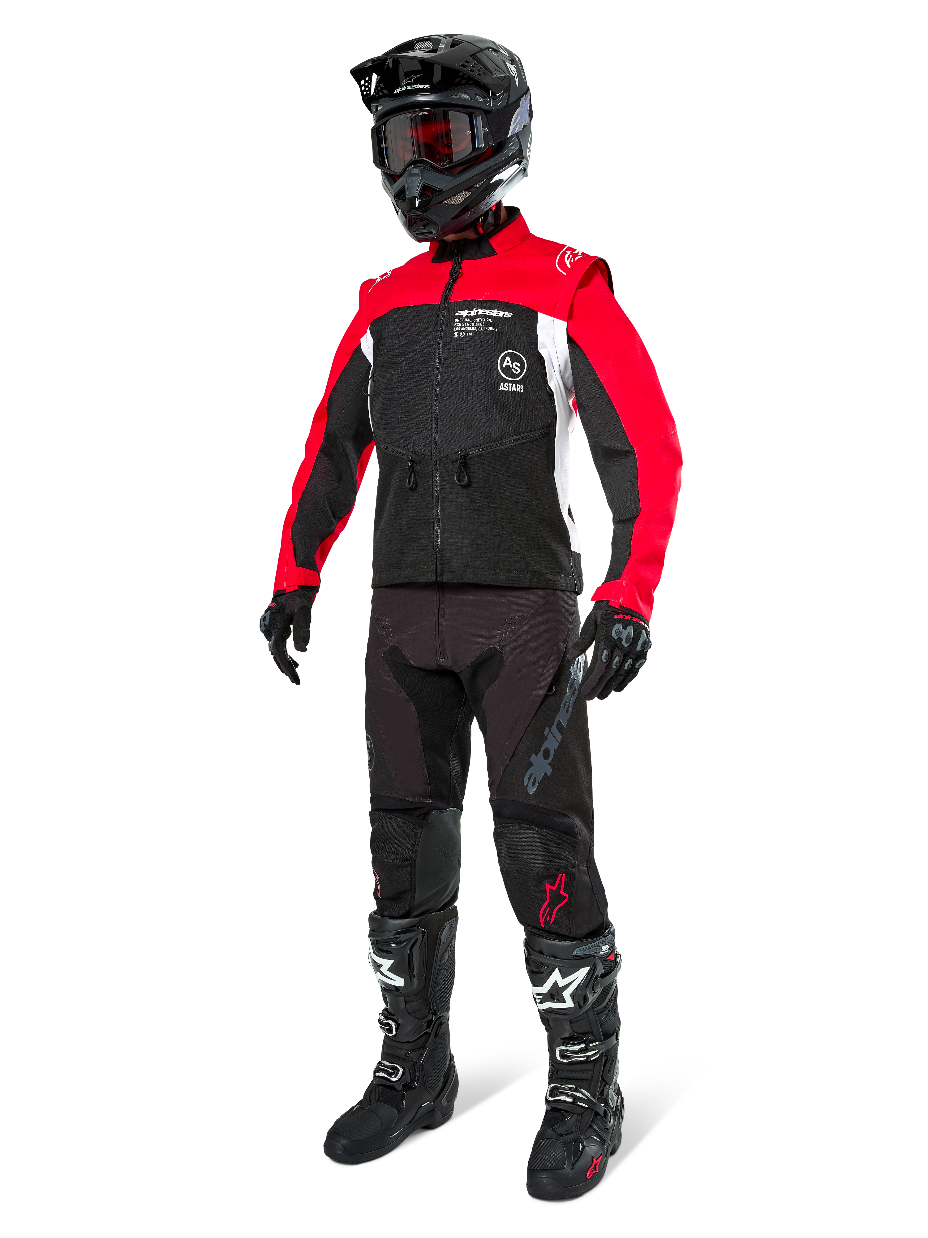 Alpinestars Pro-Dura jakke, off-road motorcykeljakke, sort, klar rød og hvid, vist med komplet racerudstyr inklusive sort hjelm med røde goggles, sorte bukser og sort-hvide støvler, slidstærkt tekstilsæt til enduro- og trailkørsel