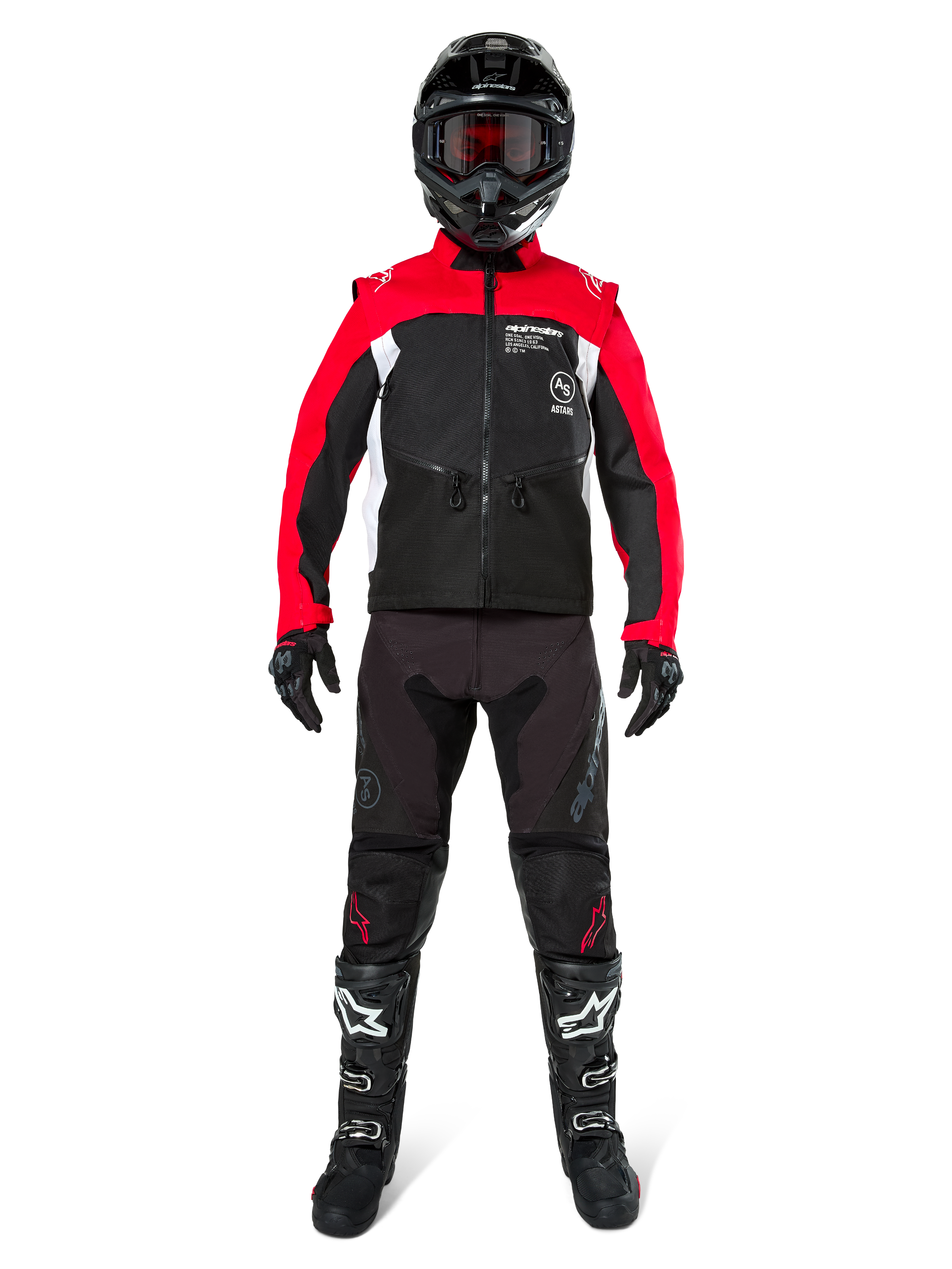 Motocross-kører iført komplet off-road-udstyr, Alpinestars Pro-Dura jakke i sort, lys rød og hvid, sorte bukser med røde detaljer, sort hjelm med røde goggles, sort-hvide støvler, koordineret sæt til enduro- og trailkørsel