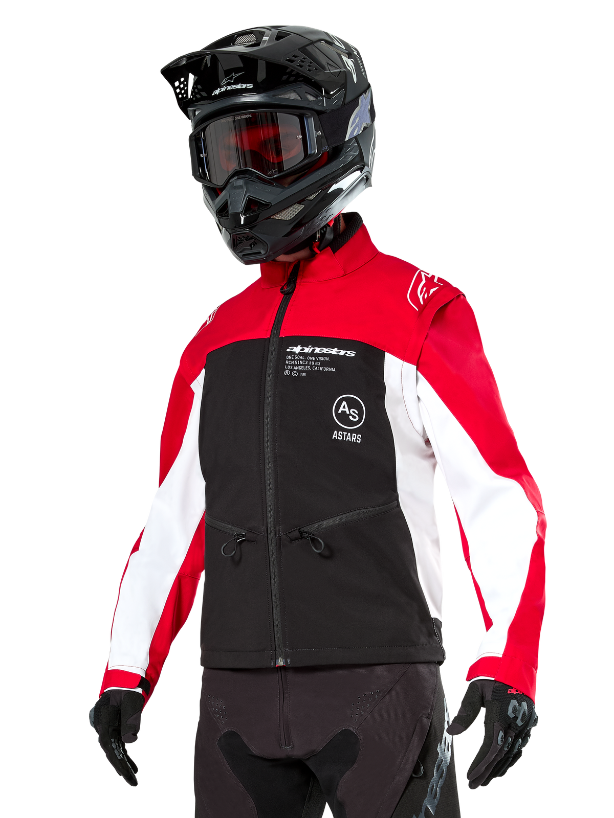 Alpinestars Lite-Dura Softshell Jacket, Motorcycle Jacket, Black, Bright Red, and White, worn by a rider with a black motocross helmet, red goggles, and gloves, featuring bold branding on the chest, designed for off-road and enduro riding