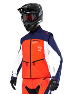 Alpinestars Lite-Dura Softshell Jacket in Navy, Hot Orange, and White, Motocross Gear, worn with black helmet and goggles, protective gloves, and matching racing pants