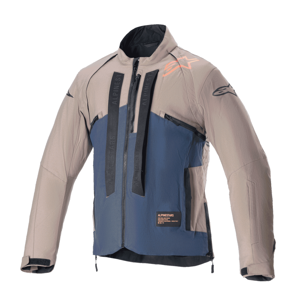 Alpinestars Techdura jakke, off-road motorcykeljakke, Falcon Brown og Night Navy, set forfra, tofarvet konstruktion med lodret sort Alpinestars-branding, orange logo på skulderen, høj krave og lynlås foran, teknisk beklædning til enduro- og adventure-kørsel