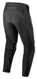 Alpinestars Techstar Phantom bukser, motocross-bukser, antracit og neon grøn, set bagfra med neon grøn 'ASTARS' branding på taljen, mesh-ventilationspaneler bag på benene og forstærket sæde for holdbarhed til off-road racing