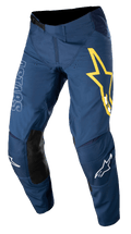 Alpinestars Techstar Phantom bukser, motocross-bukser, mørkeblå med gule og hvide detaljer, sorte læderpaneler på knæene, stort gult stjernelogo på låret, hvid ASTARS-branding, slidstærkt stretch ripstop-stof til off-road racing