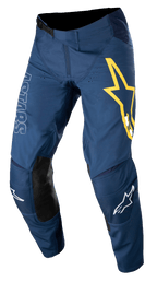 Alpinestars Techstar Phantom bukser, motocross-bukser, mørkeblå med gule og hvide detaljer, sorte læderpaneler på knæene, stort gult stjernelogo på låret, hvid ASTARS-branding, slidstærkt stretch ripstop-stof til off-road racing