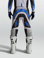 Alpinestars Supertech Hiten AFD Motocross Pants for men in Black and Blue, featuring an athletic race-proven fit.
