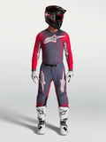 Alpinestars Supertech Hiten AFD Gear Set og bukser, professionelt motocrossudstyr til terrænkørsel, grå og rød fluo.