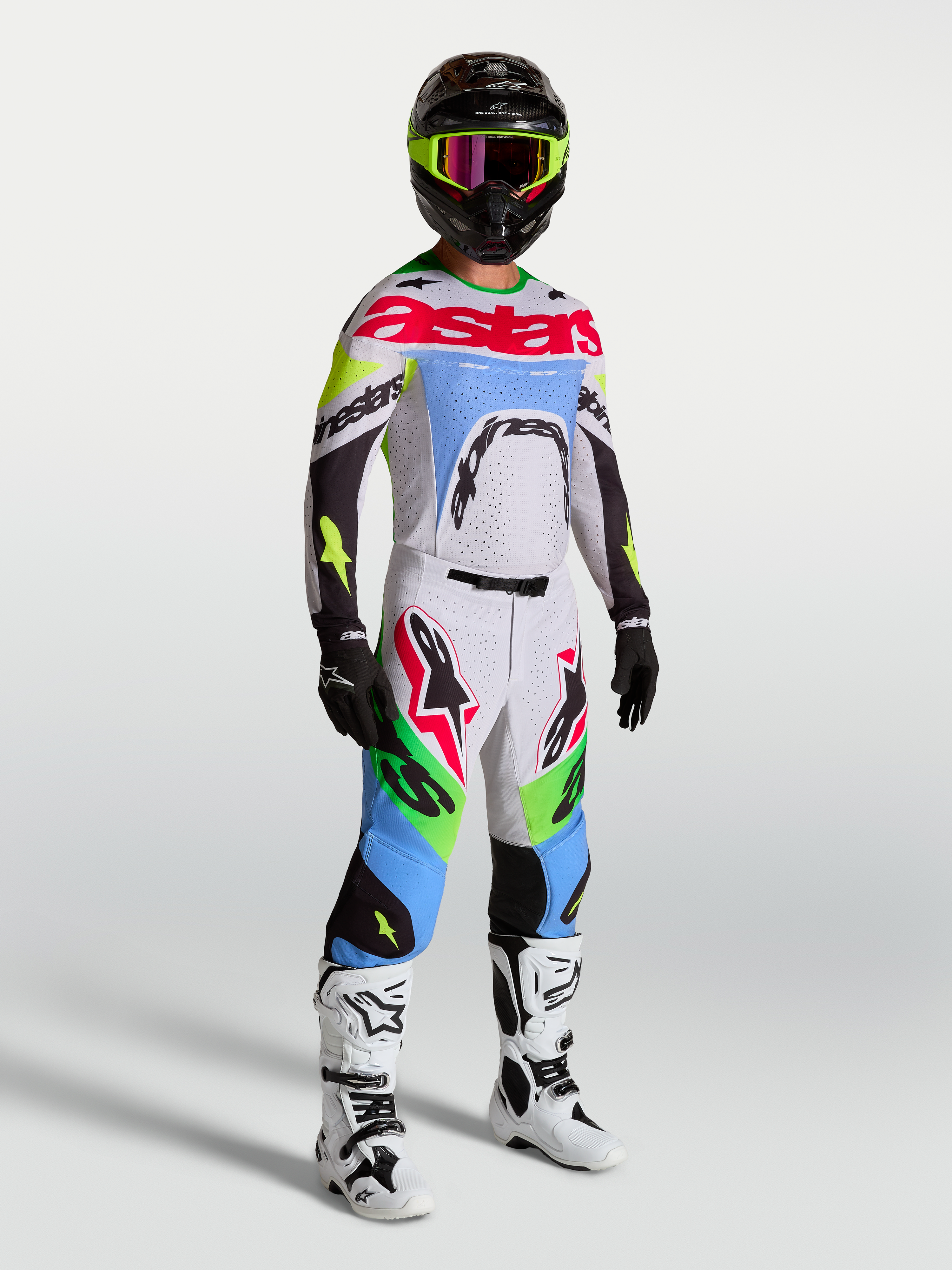 Alpinestars Supertech Dyna Pants, Men's Motocross Gear, Light Lilac and Green Fluo, on-model as part of a full racing kit.
