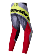 Alpinestars 2025 Techstar Melt Pants, Motocross Pants, Bright Red and Gray with Neon Yellow accents, rear view showing large black Alpinestars branding on the seat, Astars logos on the legs, durable multi-material design for off-road racing