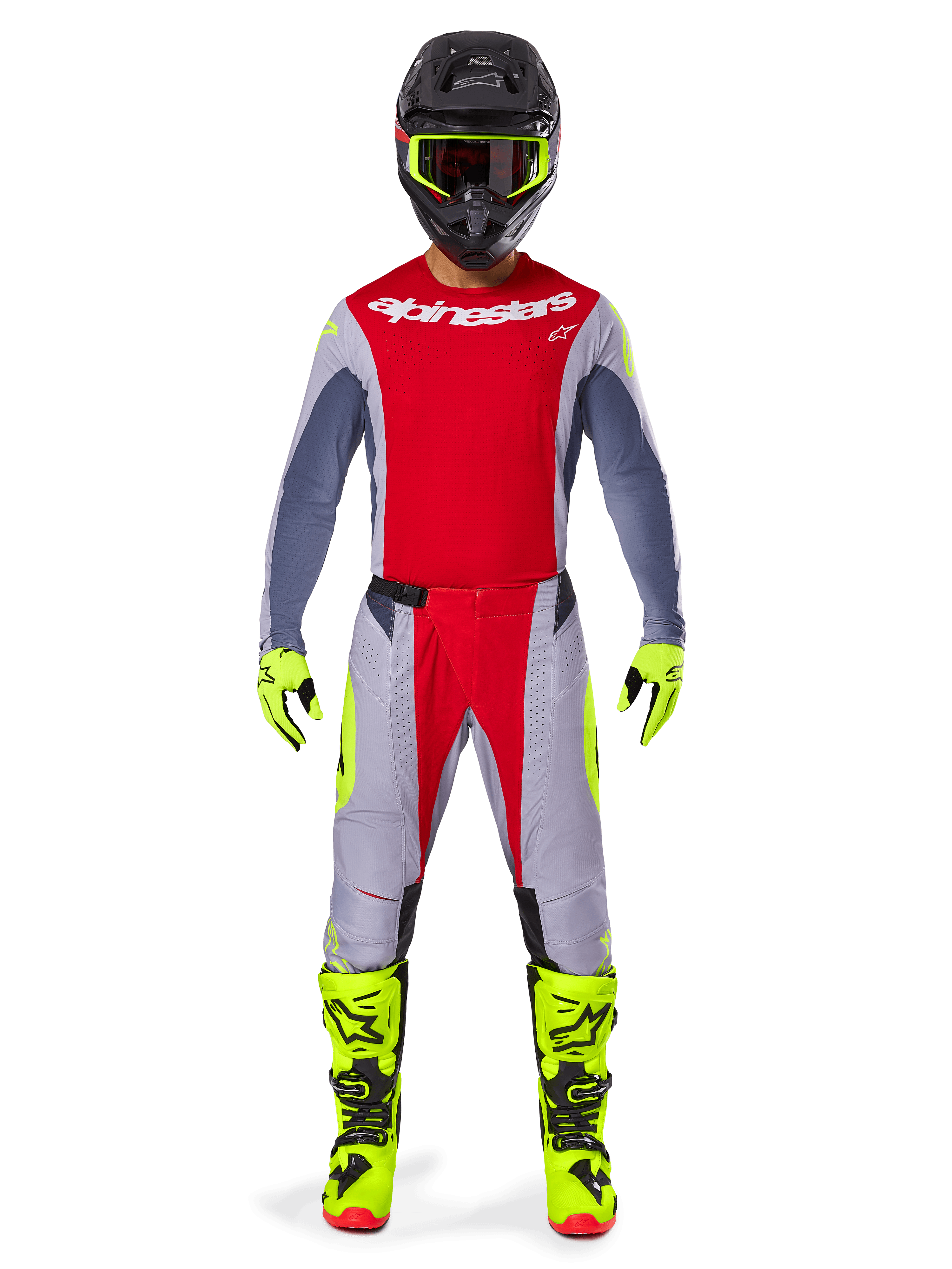 Motocross rider wearing Alpinestars 2025 Techstar Melt Pants in Bright Red and Gray, featuring vibrant red panels and fluorescent yellow accents, paired with a matching jersey, black helmet with fluorescent yellow goggles, and bright yellow boots and gloves, coordinated outfit for professional motocross racing.
