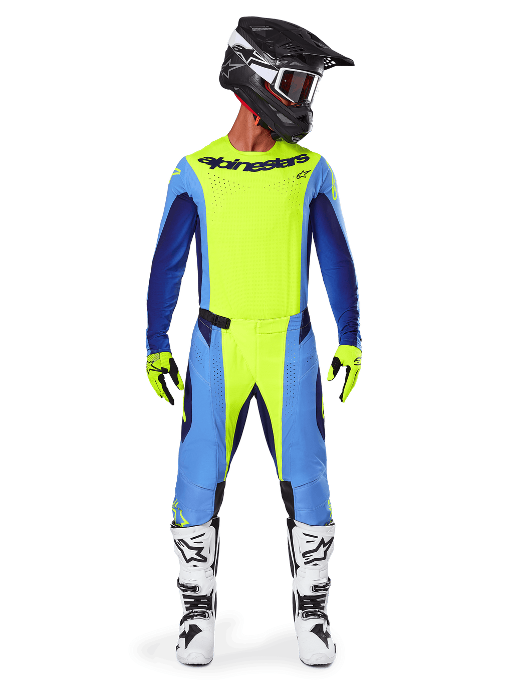 Motocrosskører iført Alpinestars 2025 Techstar Melt-udstyrssæt, neongul jersey med blå og navyblå ærmer, matchende gule og blå bukser, sort og hvid hjelm med goggles, hvide og sorte støvler, gule og sorte handsker, koordineret outfit til off-road racing