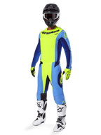 Alpinestars 2025 Techstar Melt Gear Set, komplet motocross-raceroutfit, neongul og blå, sort hjelm med goggles, gule og sorte handsker, hvide og sorte støvler, fuldt MX-udstyrssæt