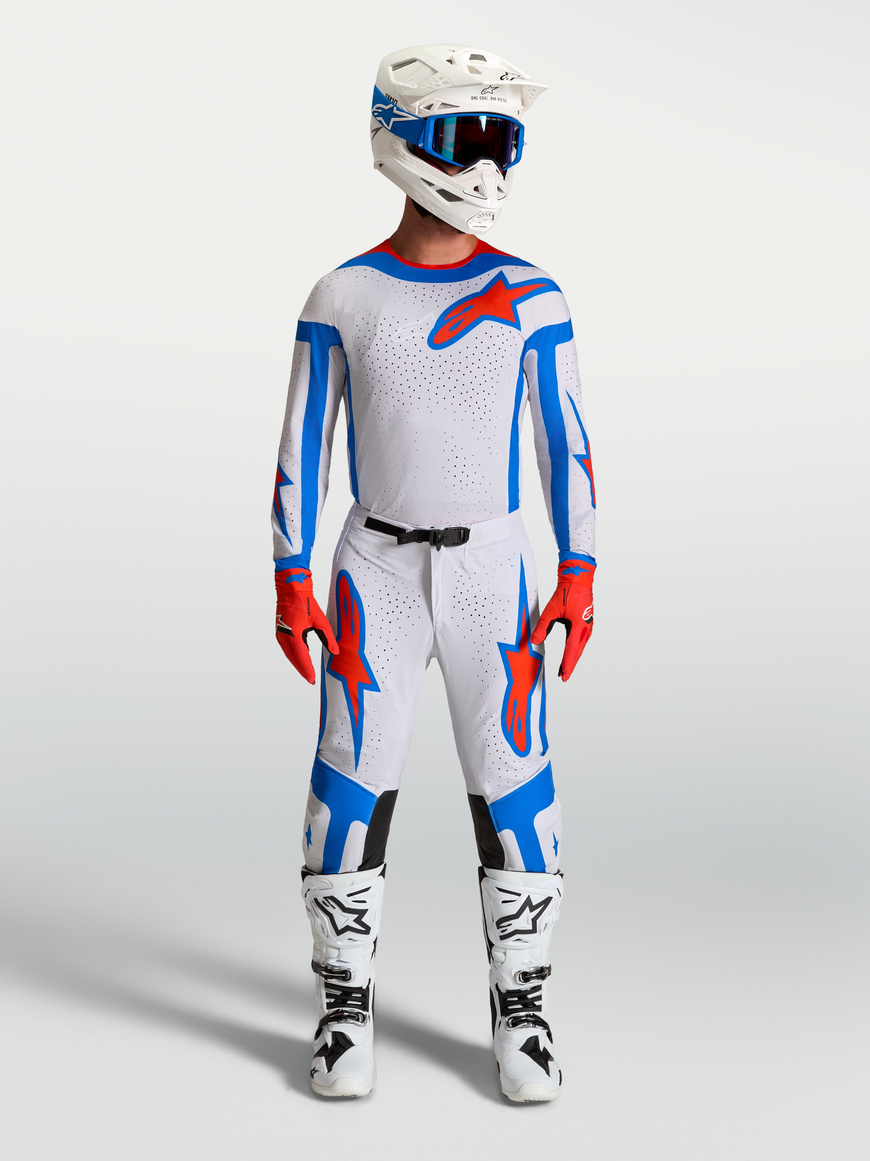 Alpinestars Supertech Vesta Motocross Gear Set in Light Lilac and Cardinal Red, featuring racing jersey, pants, and boots.