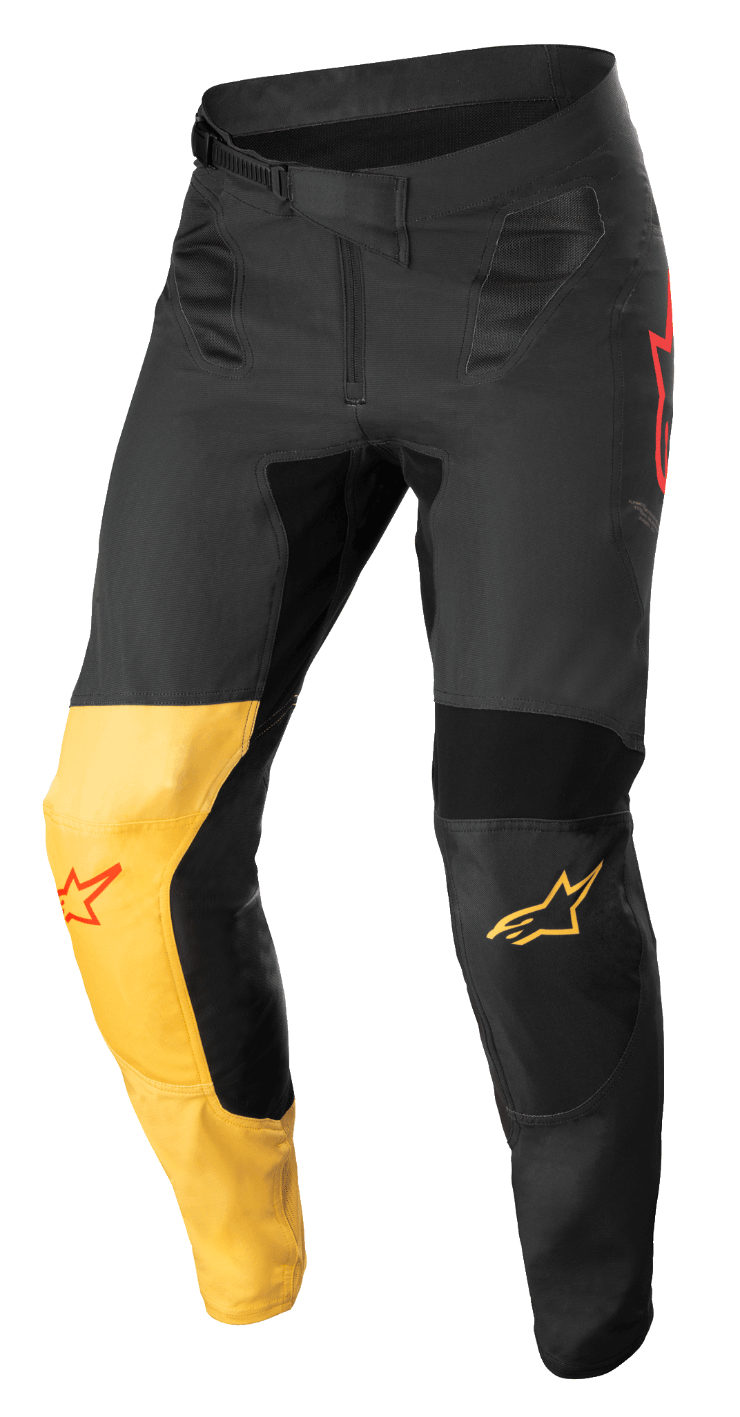 Alpinestars Supertech Blaze bukser, motocrossbukser, sort, varm gul og rød fluo, med et karakteristisk gult knæpanel, røde stjernelogo-detaljer, sikker skraldelukning i taljen og forstærkede beskyttelsespaneler til terrænkørsel.