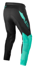 Alpinestars Supertech Blaze bukser, motocross-bukser, sort og pastelgrøn, trekvart visning bagfra, der viser ASTARS-branding på låret, åndbart mesh på den nederste del af benene og strækbart stof for ergonomisk ydeevne