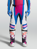 Alpinestars Techstar Maven bukser, hvide og blå motocrossbukser med koralfarvede detaljer og knæpaneler i læder.