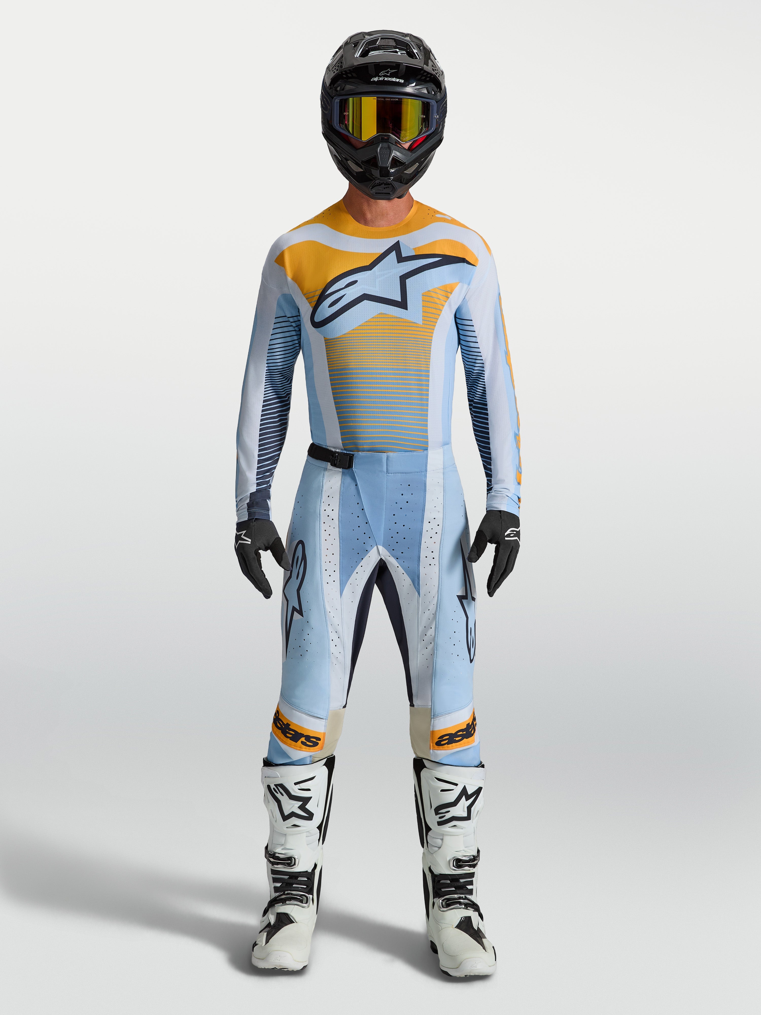 Alpinestars Techstar Maven bukser, herre-motocrossbukser i blå og orange, designet med race-pasform og strækzoner til off-road kørsel.