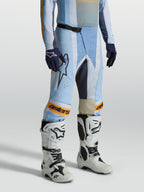 Alpinestars Techstar Maven bukser, lyseblå og orange motocrossbukser med ergonomisk race-pasform til off-road kørsel.