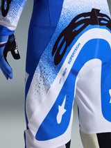 Alpinestars 2026 Supertech Scenz Pants, Motocross Pants, Ucla Blue and White, close-up of the side and rear showing large black A-star logo and 'SUPERTECH' branding, featuring perforated ventilation zones and durable stretch fabric.