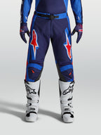 Alpinestars Racer Hunt bukser, blå og røde motocrossbukser til mænd, slidstærk forbøjet konstruktion med stjernegrafik.