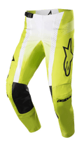 Alpinestars 2023 Techstar Push-bukser, motocross-racerbukser, neongul og hvid med sorte detaljer, med indvendige knæforstærkninger i sort læder, perforerede ventilationspaneler, stort sort logo på låret og justerbart taljespænde, højtydende offroad-udstyr