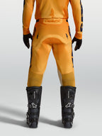 Alpinestars Racer Amber bukser, orange og mørkeblå motocrossbukser til herrer, set bagfra med forstærket sæde