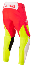 Alpinestars Techstar Factory bukser, motocrossbukser, rød fluo, hvid og gul fluo, set bagfra med ASTARS-branding på linningen og klare gule mesh-paneler på benene