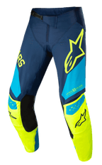 Alpinestars Techstar Factory bukser, motocross racingbukser, mørkeblå, neongul og lyseblå, med sorte indvendige knæpaneler, gult stjernelogo på låret, "ONE GOAL ONE VISION" branding og perforerede ventilationszoner til off-road udstyr