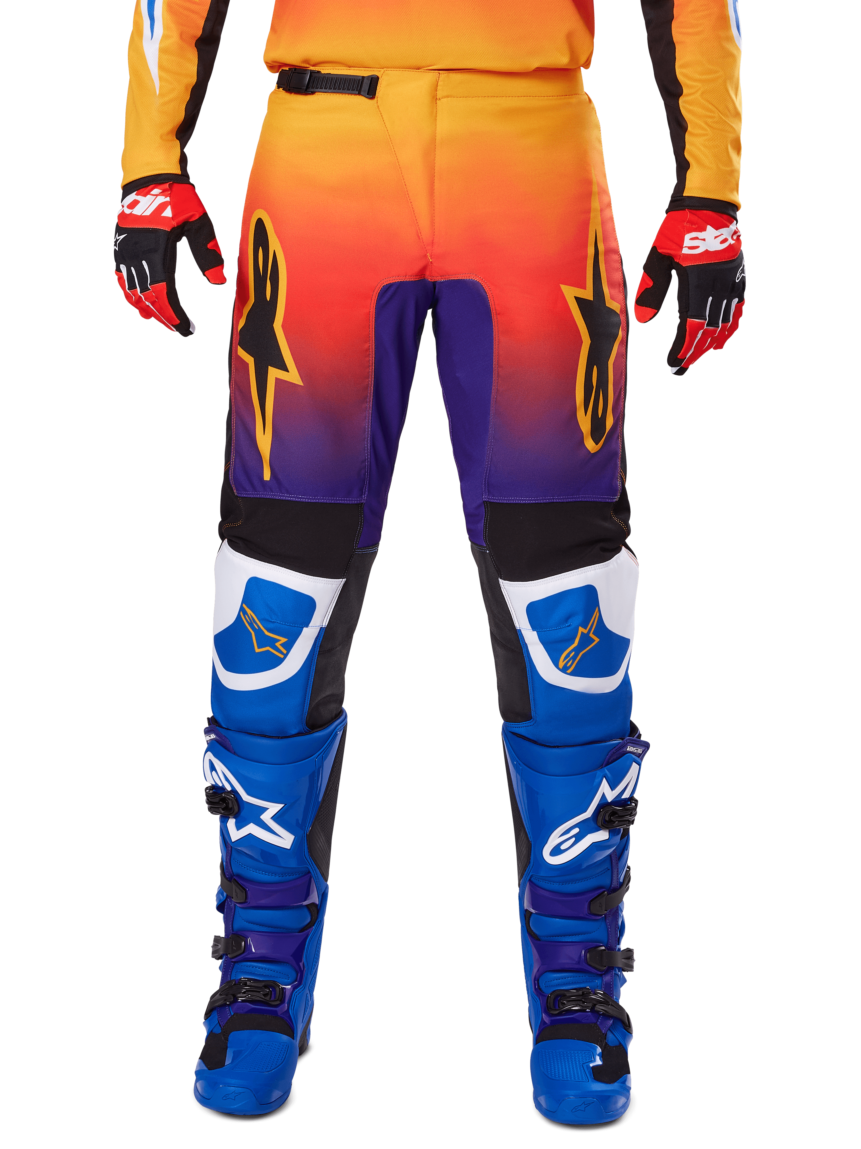 Alpinestars 2025 Fluid Wurx Pants, Motocross Pants, Multicolor featuring orange-to-purple gradient and blue panels, worn with matching blue and purple boots and red and black gloves, front view with star logo branding.