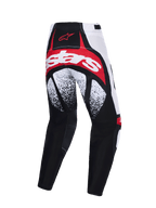 Alpinestars 2026 Techstar Nomur bukser, motocrossbukser, sort hvid og rød, set bagfra med markant rød og hvid branding over sædet, sort-hvidspættede mønstre på lårene og multi-panel performance-konstruktion