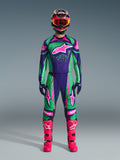 Alpinestars 2026 Techstar Nomur Gear Set, motocross racingudstyr, livlig grøn, lilla og pink, stort stjerne-logo på bryst og lår, sort hjelm med pink og gule detaljer, stærkt pink støvler, professionelt sportsligt design