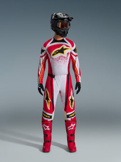 Alpinestars 2026 Techstar Nomur Gear Set, Motocross racing suit, Red white and black with yellow star logos, complete riding outfit featuring helmet, goggles, gloves, and boots, athletic race design for off-road performance