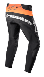 Alpinestars 2023 Techstar Sein bukser, motocross-bukser, sort og Hot Orange, set bagfra med stærkt orange taljepanel og sort logo, stort hvidt Alpinestars-branding over bagen, forstærket tekstilkonstruktion til off-road racing
