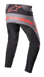 Alpinestars 2023 Techstar Sein bukser, motocross-bukser, sort og neonrød, set bagfra med et gråt sædepanel med stort neonrødt logo, ergonomiske forbøjede ben og slidstærk tekstilkonstruktion til off-road-ydeevne