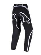 Alpinestars 2026 Fluid Apex bukser, motocross-bukser, sort og hvid, set bagfra med stort hvidt stjerne-logo på sædet, ergonomisk design med buede hvide detaljer, slidstærkt 600D polystof til off-road kørsel