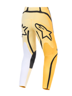 Alpinestars 2026 Fluid Apex bukser, motocrossbukser, gul og sort med hvide detaljer, set bagfra med markant sort Astars-logo, asymmetrisk design med holdbare forstærkede paneler og forbuet pasform.