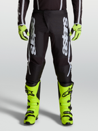 Alpinestars Fluid Apex V2 bukser, motocrossbukser til mænd, sort og sølv, ergonomisk 3D-mønster med stretchfløjlspaneler til off-road kørsel