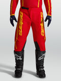 Alpinestars Fluid Apex V2 bukser, motocrossbukser til herrer i rød og guld med slidstærk 600D polyfabric-forstærkning.