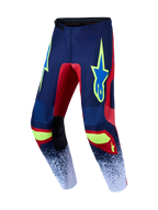 Alpinestars 2027 Fluid Drag motocrossbukser i mørkeblå og rød med beskyttende poly-tekstil og neongule detaljer.