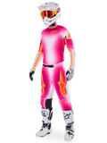 Alpinestars Supertech AFD MIG Limited Edition udstyrssæt, motocross-udstyr, trøje og bukser med lyserød fluo, hvid og orange graduering, hvid hjelm med orange goggles, hvide og sorte støvler, professionelt tøj til terrænkørsel