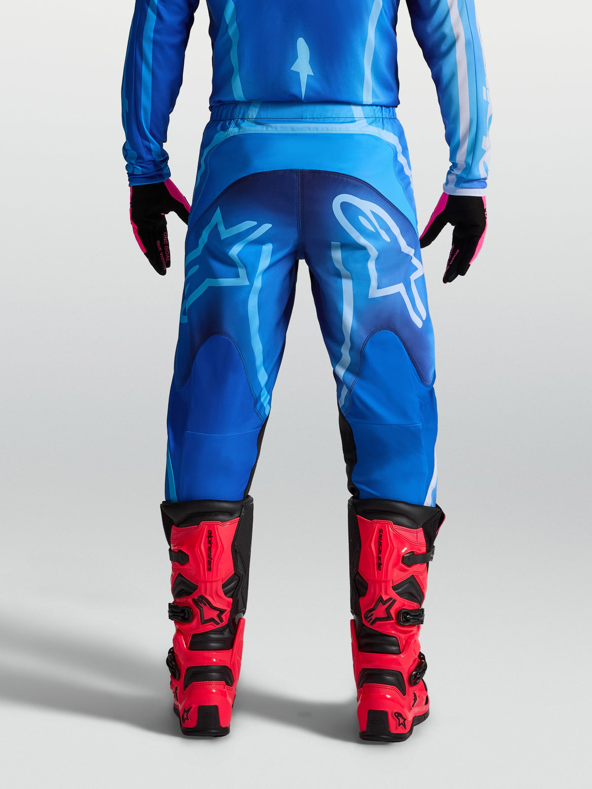 Alpinestars Fluid Kepler Men's Motocross Pants in Blue, durable 600D polyfabric construction, shown on model.