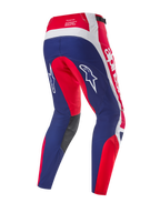 Alpinestars Limited Edition Techstar Fortitude bukser, motocross-bukser, rød, hvid og blå, set bagfra med fokus på ergonomiske racerpaneler, hvide Alpinestars-logoer, mørkegrå indvendige knæpaneler