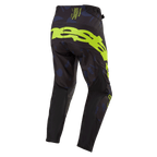 Alpinestars 2024 Techstar Rantera bukser, motocross-bukser, sort, navy og neongul, set bagfra med iøjnefaldende neongul branding på sædet, navy-mønstrede paneler og teknisk sort stof til off-road racing-ydeevne
