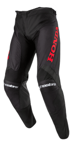Alpinestars Honda Racer Iconic bukser, motocrossbukser, sort med rød branding, med et stort rødt Honda-logo på låret og hvid Alpinestars-tekst på knæene, sportssnit til off-road performance